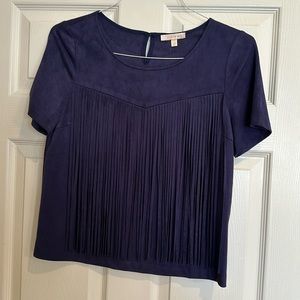 Cute top, velvet feel a fun fringe.